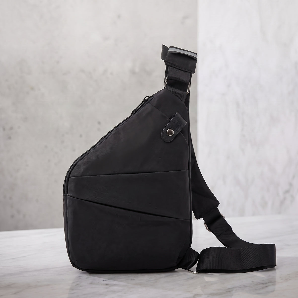 Mochila Vera — antirrobo, plana y pegada al cuerpo